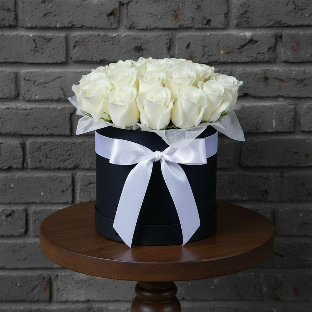 Цветочная композиция из Розы в шляпной коробке в Рудне Волгоградской области